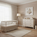 Modern Nursery Room with Baby Crib and White Dresser