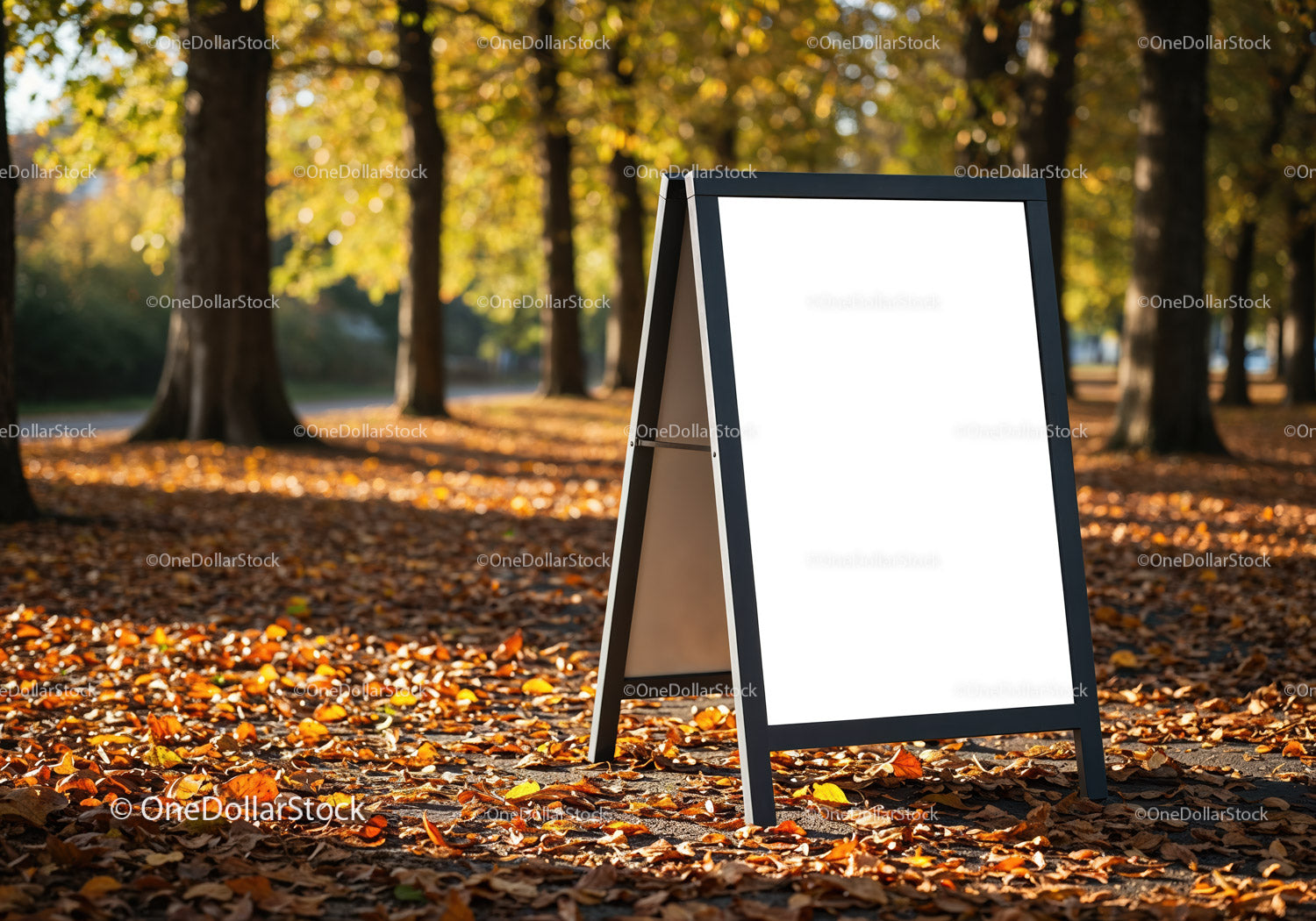 Blank sidewalk sign in a sunny autumn park setting