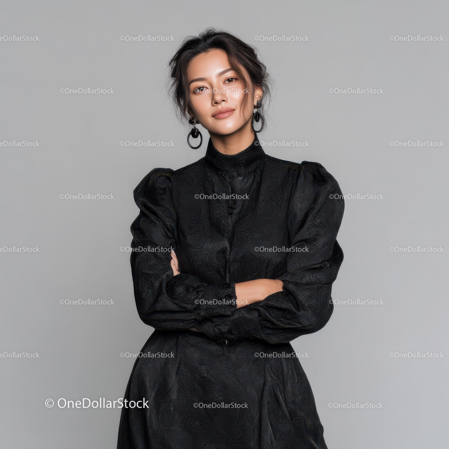 Elegant Young Woman in Black Dress with Crossed Arms Portrait