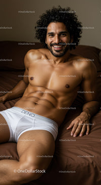 Smiling man relaxing on brown bed in white underwear