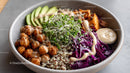 Vibrant Vegan Salad with Chickpeas and Quinoa in a Ceramic Bowl