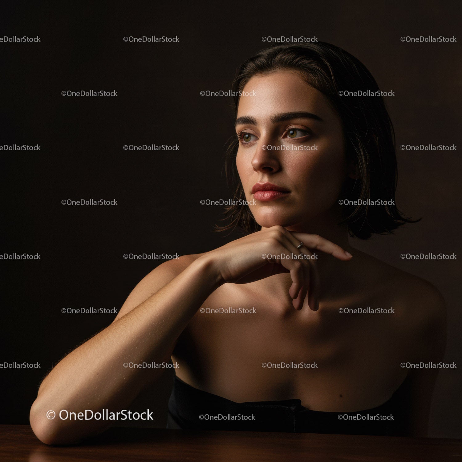Elegant Woman Portrait with Short Dark Hair and Thoughtful Expression
