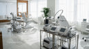 Modern Hospital Treatment Room with Medical Equipment and Chairs