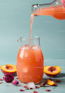 Refreshing Peach Juice Poured Over Ice in Glass Pitcher