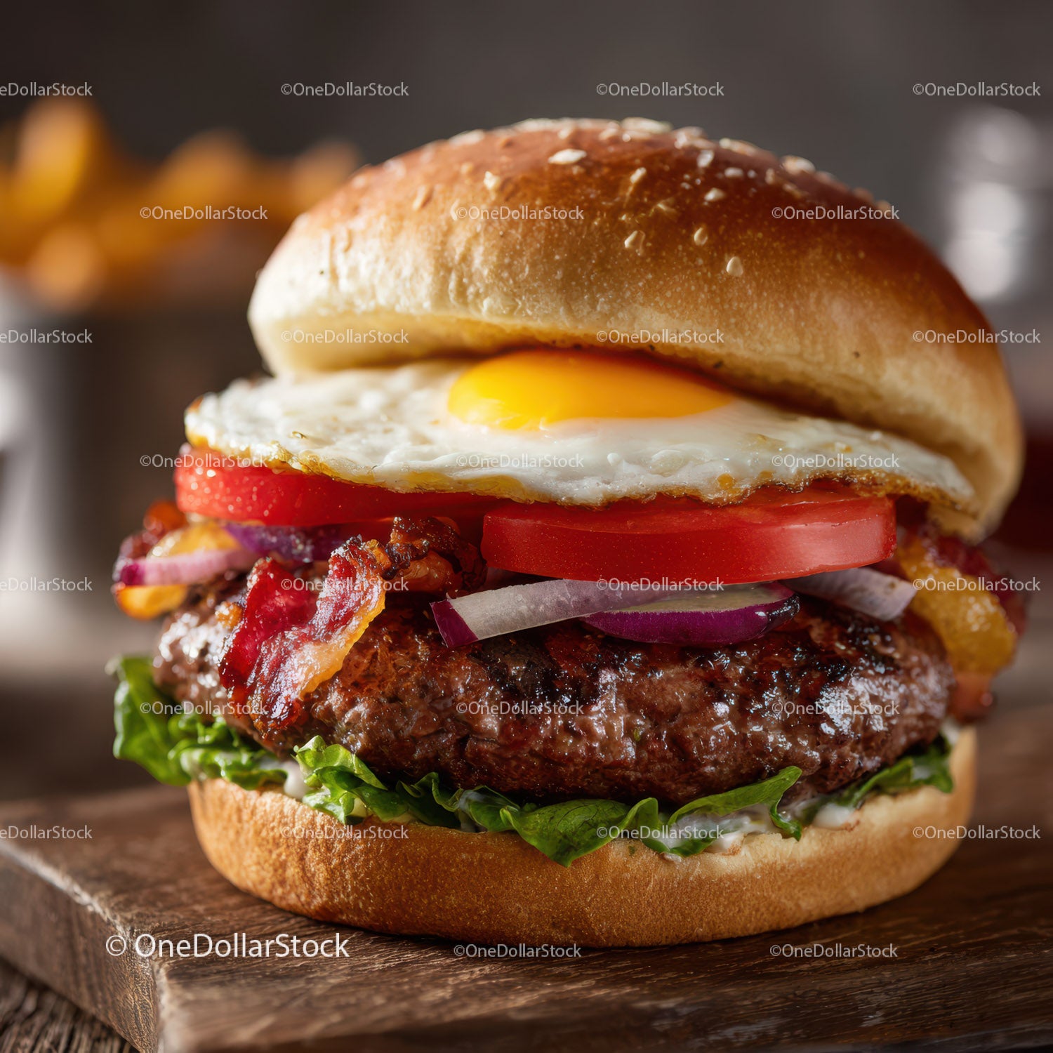 Juicy Beef Cheeseburger with Egg Lettuce Tomato and Bacon