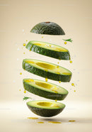 Floating sliced avocado with oil and salt drops