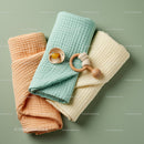 Soft pastel baby blankets with pacifier and teething toy