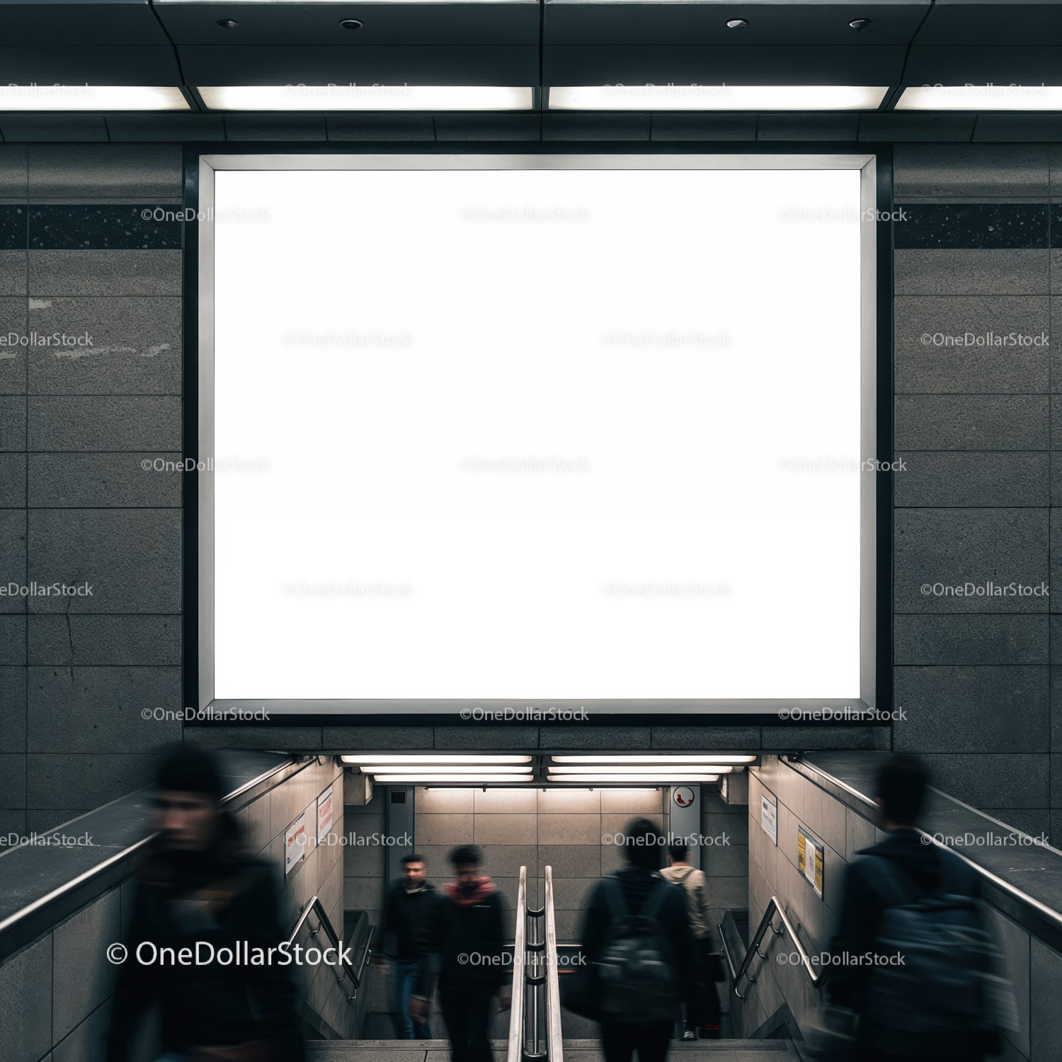Commuters descending stairs under blank urban billboard