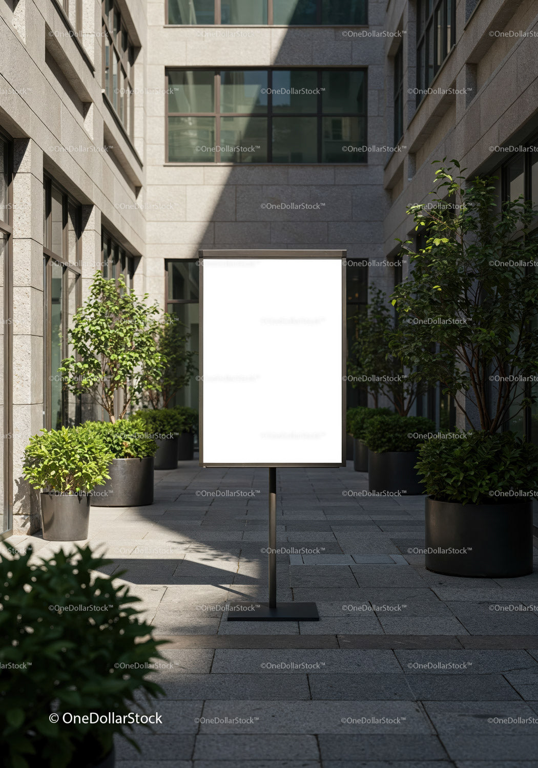 Blank urban signage surrounded by potted greenery