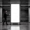Blurred Man Walking Past Large Blank Advertising Panel