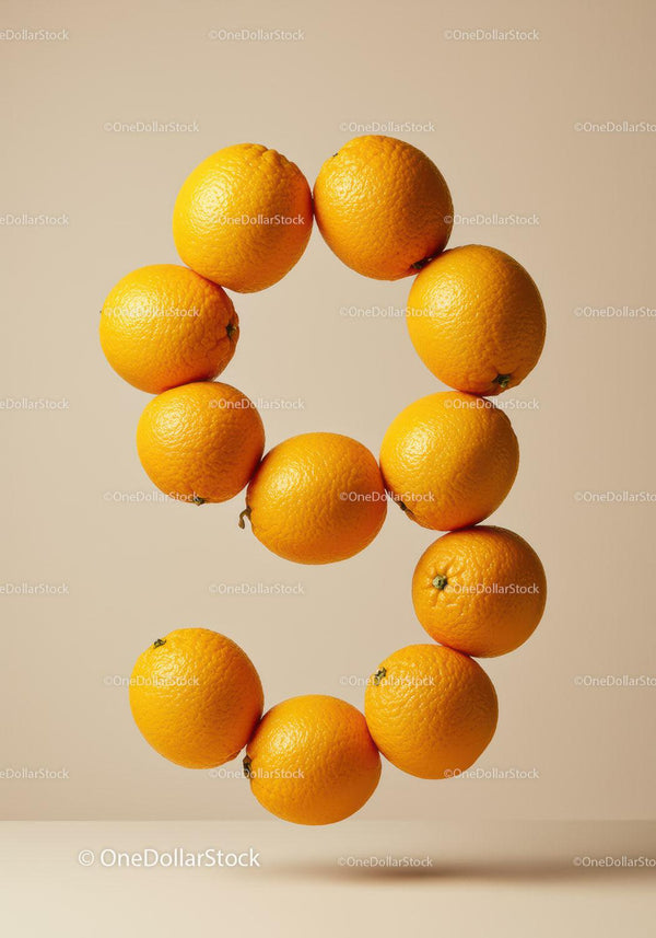 Floating Oranges Arranged in Number Nine Shape