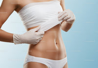 Woman Removing Medical Bandage from Abdomen for Healthcare Treatment