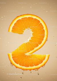 Fresh orange slice shaped like number two with droplets