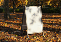 Blank A-Frame Sign Board in Autumn Park Setting