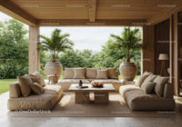Cozy outdoor lounge area with neutral sofas and lush greenery