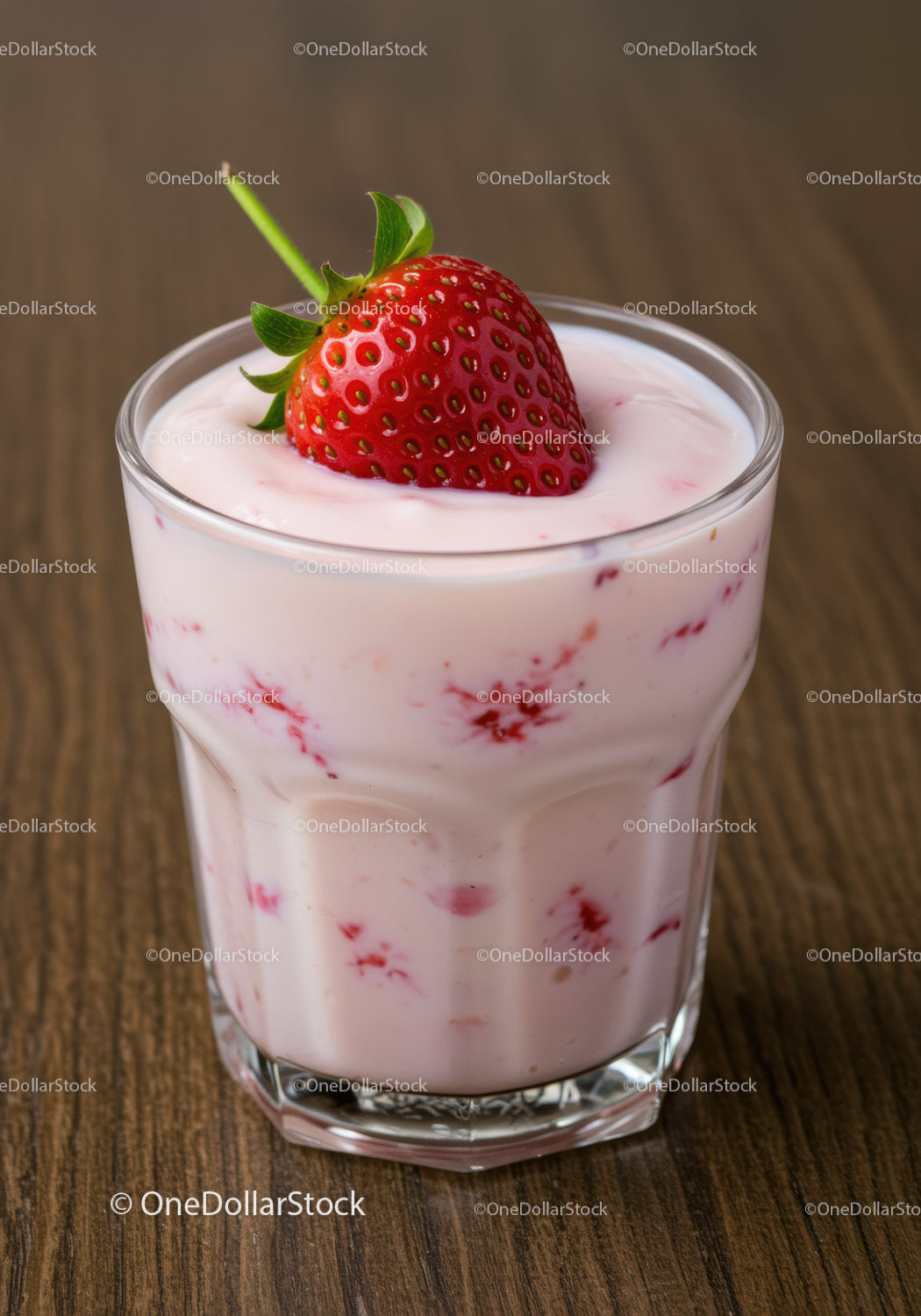 Fresh strawberry yogurt dessert in clear glass