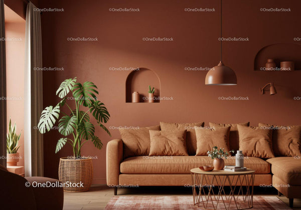 Stylowy nowoczesny salon z terakotową ścianą i zielonymi roślinami