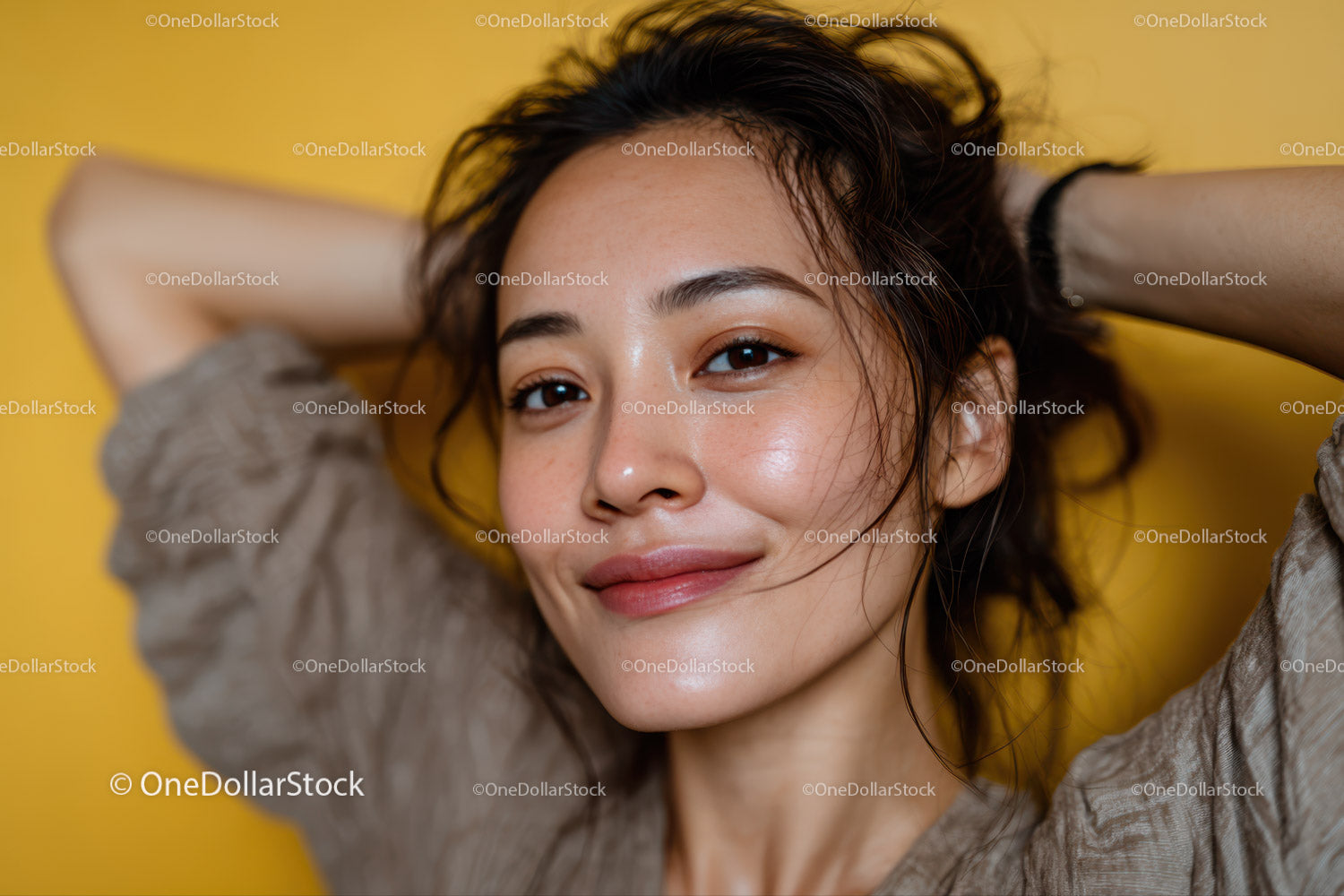Beautiful Woman with Natural Makeup and Tousled Hair Close-Up