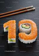 Sushi Rolls Arranged to Form Number Nineteen on Slate