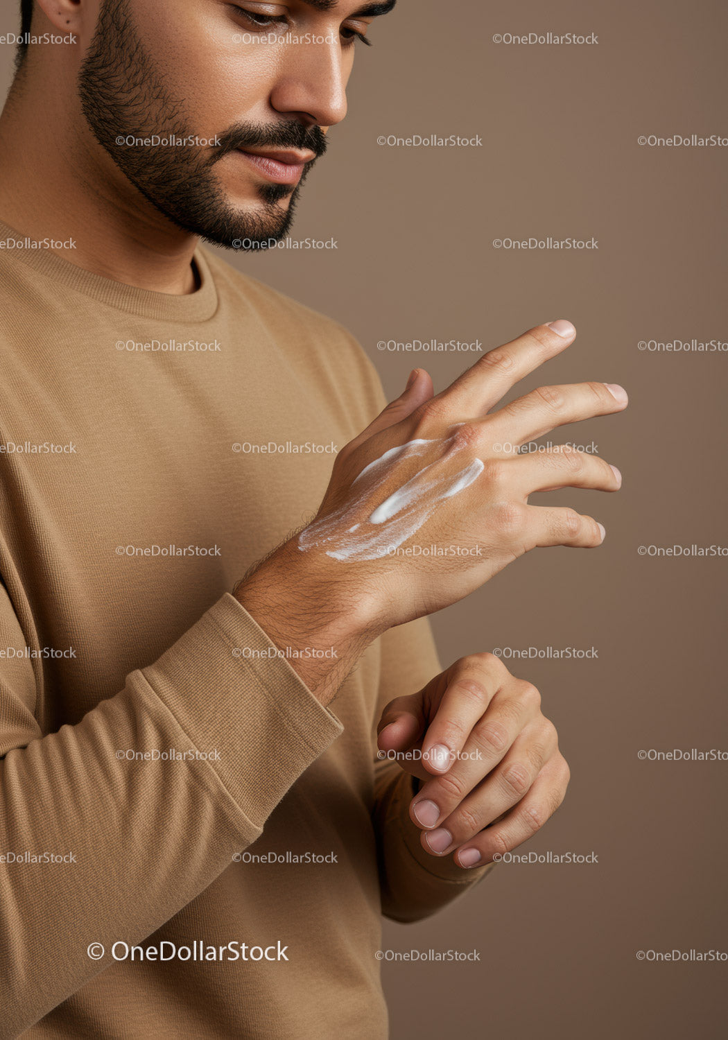 Male Hand Grooming and Moisturizing Routine in Warm Tones