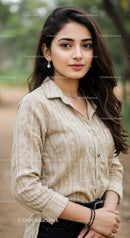 Portrait of a Young Woman in Beige Shirt in Natural Outdoor Setting