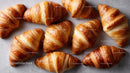 Golden Croissants on a Baking Tray for Breakfast and Brunch