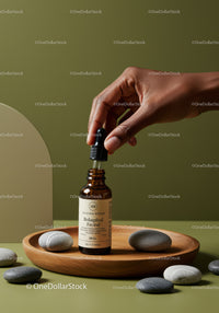 Facial Serum Dropper with Natural Skincare Ingredients on Wooden Tray