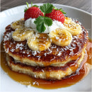 Banana and Strawberry Pancake with Whipped Cream and Caramel Syrup