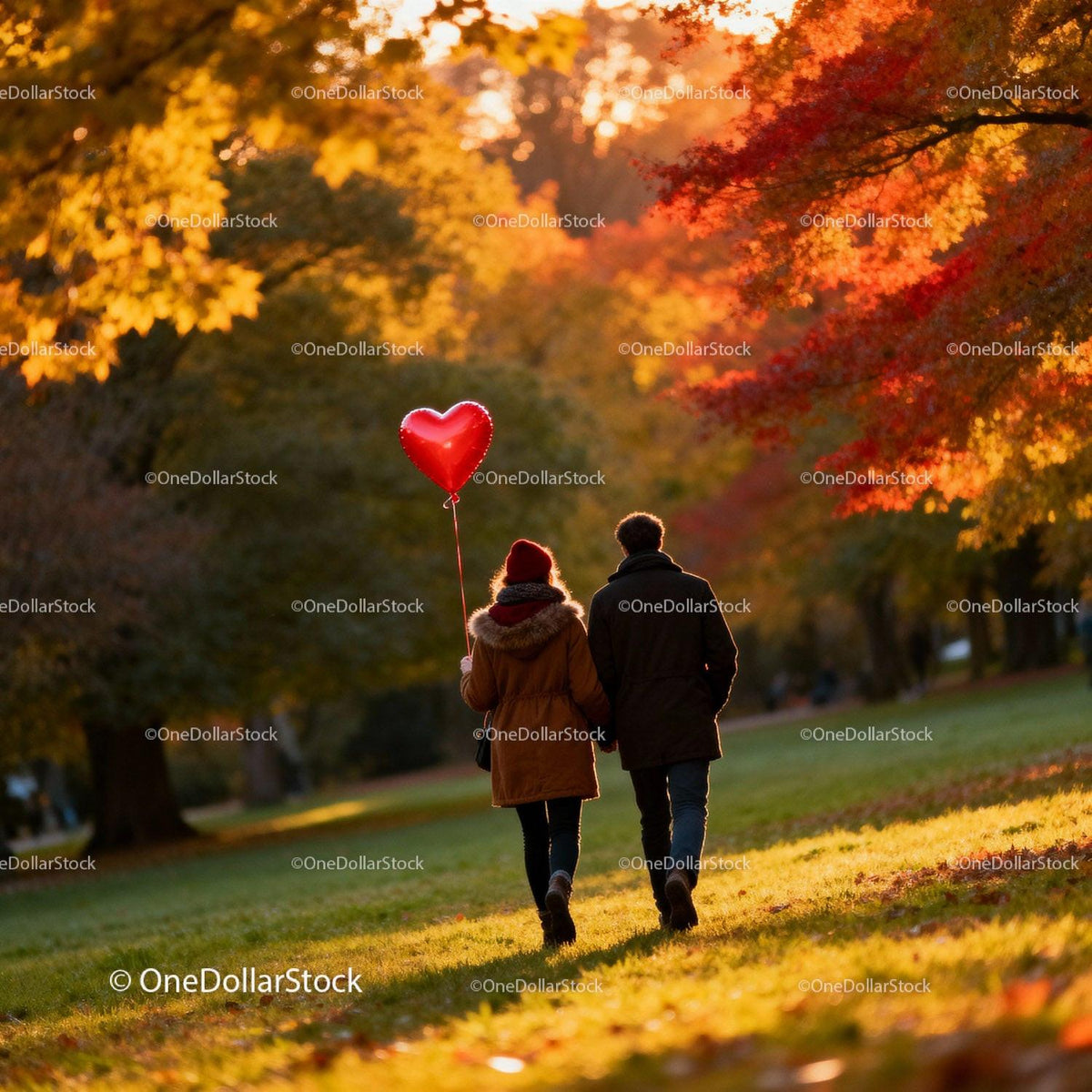 Couple Holding Heart Balloon Walking in Autumn Park