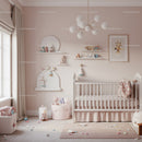Beautiful Baby Nursery with White Crib and Pastel Decor