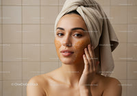 Young Woman Applying Facial Mask in Spa Room for Skincare
