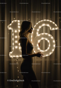 Silhouette of Woman Holding Illuminated 16 Balloon