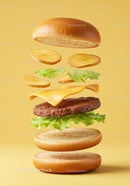 Deconstructed cheeseburger with potato slices and lettuce