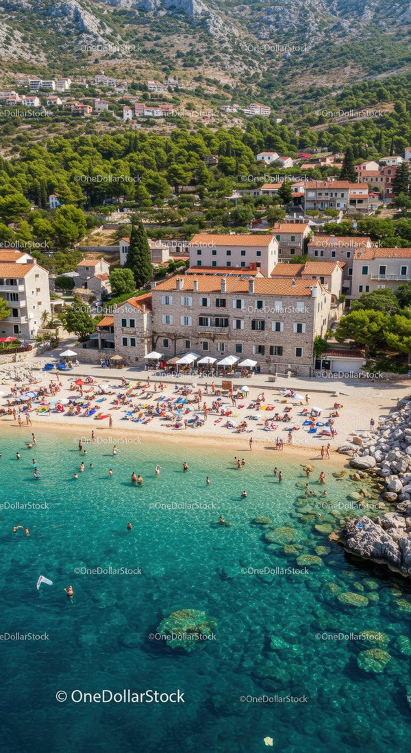 Scenic Beach with Mountain Backdrop and Vibrant Sunbathers