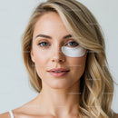 Portrait of a Blonde Woman with Clear Skin and Bright Blue Eyes