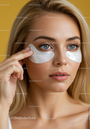 Beautiful Woman Applying Under-Eye Patches for Skin Rejuvenation
