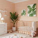 Modern Nursery Room Decor with Large Green Tropical Plant and Wall Art