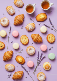 Assorted French Pastries with Tea and Lavender on Lilac