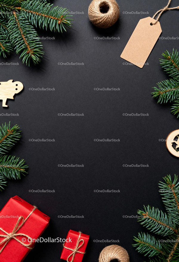 Christmas gifts and decorations on black background