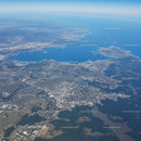 Aerial View of Coastal City with Lakes, Islands and Urban Landscape