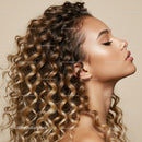 Profile of Young Woman with Natural Curly Hair and Glow