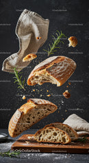 Fresh rustic sourdough bread pieces with rosemary herbs