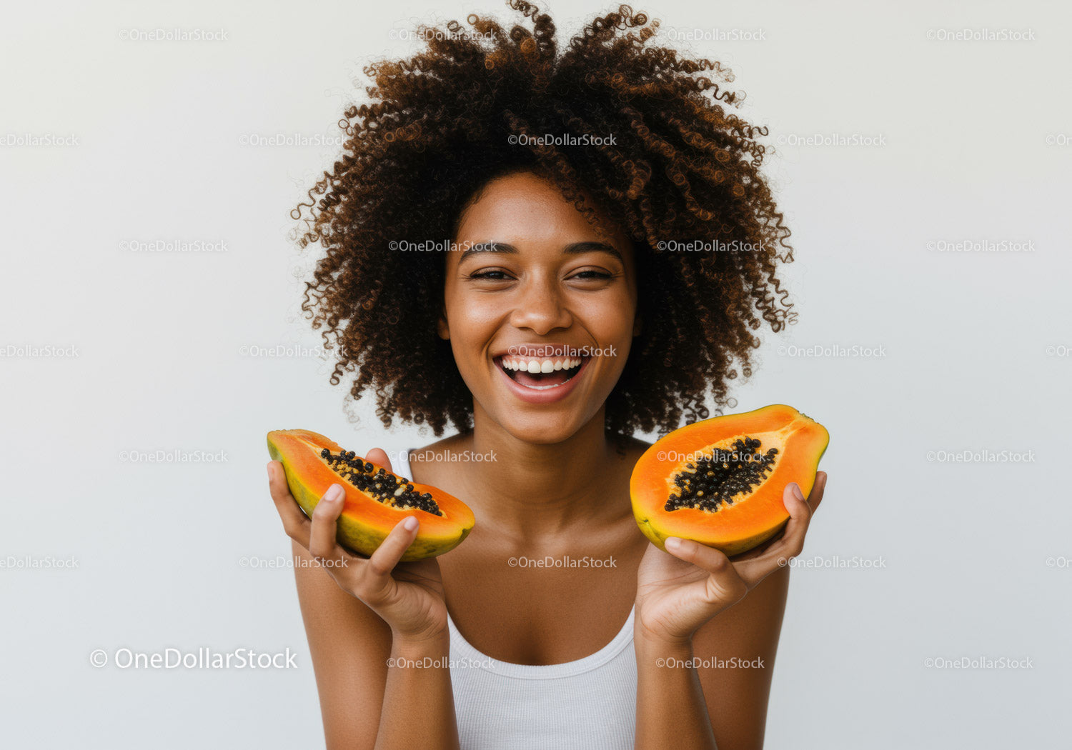 Joyful Woman Holding Fresh Papaya Slices with Black Seeds