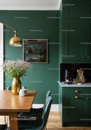 Elegant Green Kitchen with Wooden Dining Table and Gold Vase