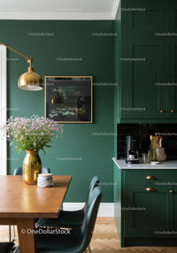 Elegant Green Kitchen with Wooden Dining Table and Gold Vase