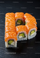 Fresh salmon sushi rolls with avocado and cream cheese