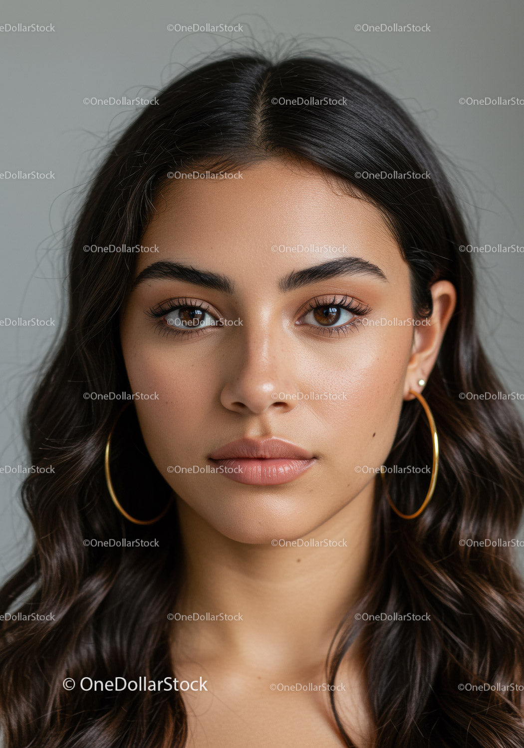 Close-Up of a Beautiful Woman with Brown Eyes and Wavy Hair