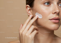 Close-up of Woman Applying Moisturizer to Cheek for Skincare Routine