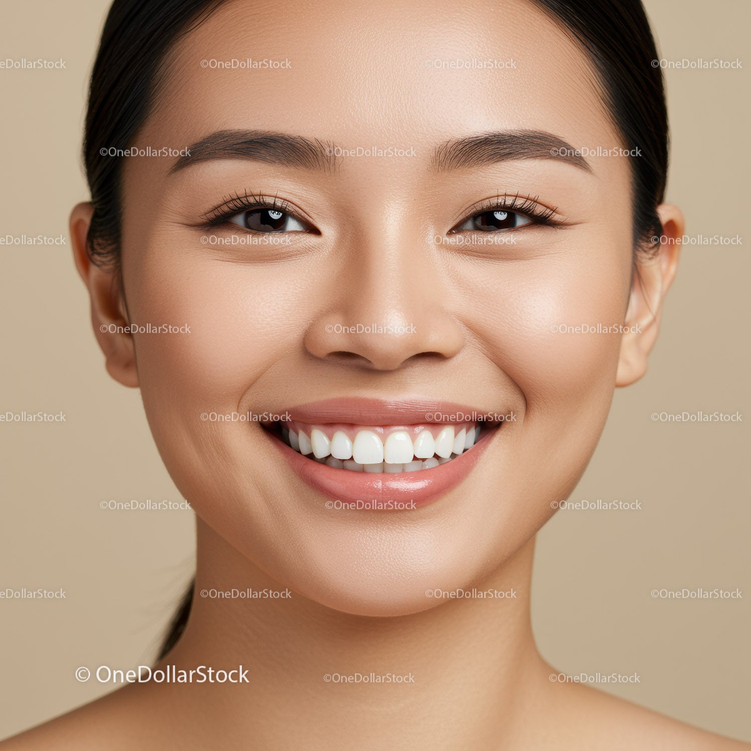 Close up of smiling woman with flawless skin