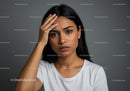 Woman with Thoughtful Expression Showing Stress and Anxiety